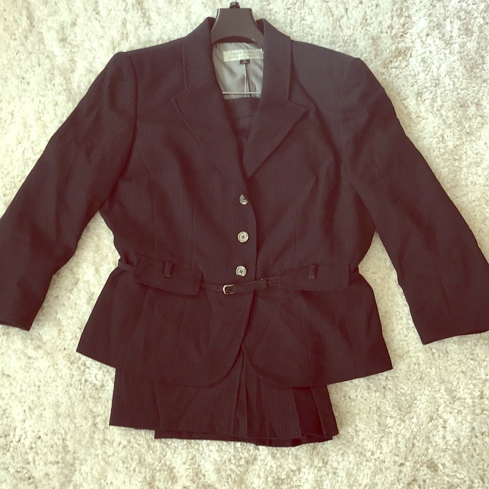 Skirt and belted jacket suit